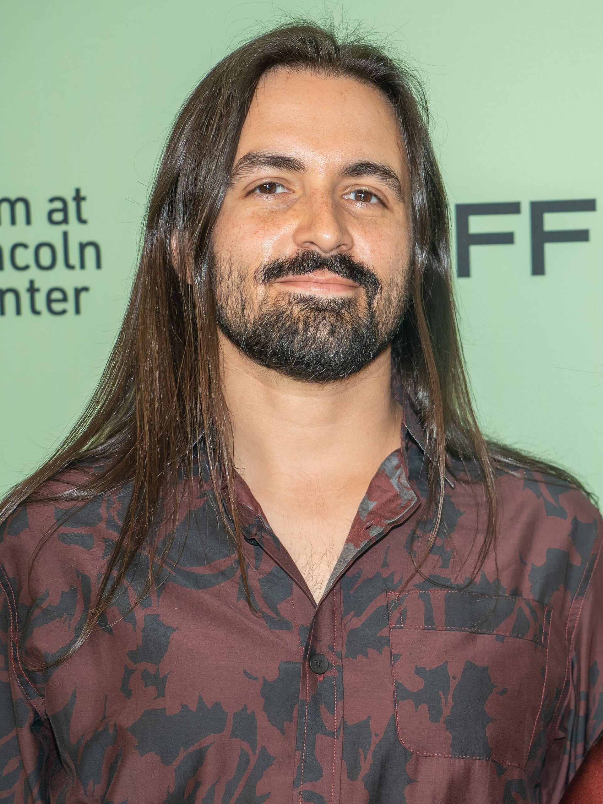 Jay Weinberg photographed at a film festival event, looking off camera in a dark jacket.