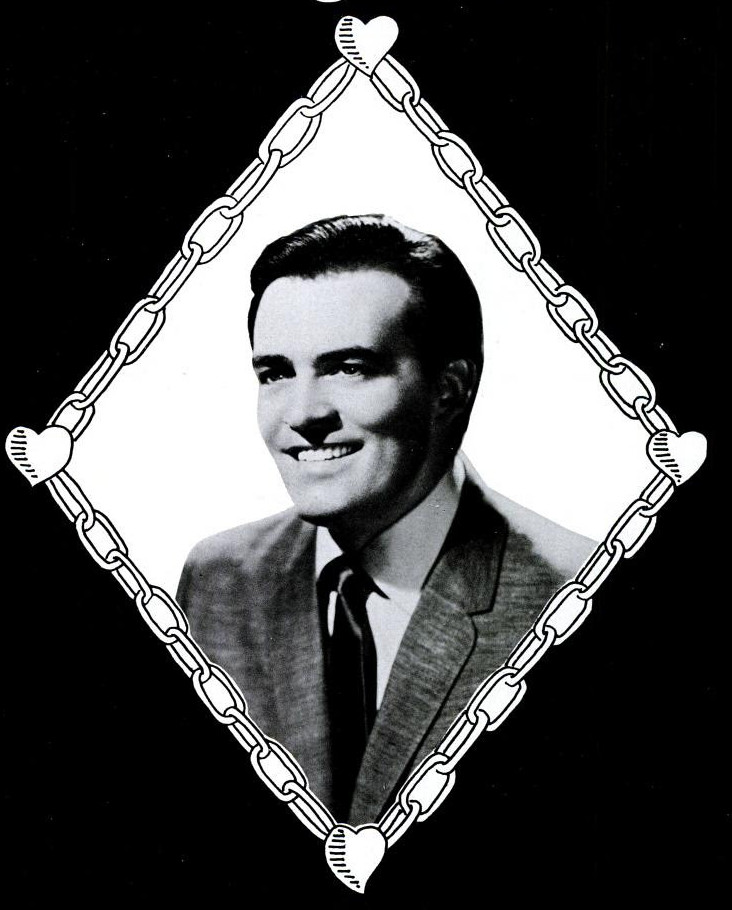 Black and white publicity portrait of a young Ronnie Dove in a suit and tie, smiling, set inside a diamond-shaped border of drawn chain links and hearts